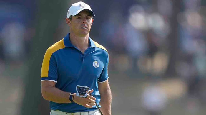 Europe's Rory McIlroy walks on the 2nd green during his singles match at the 2023 Ryder Cup.